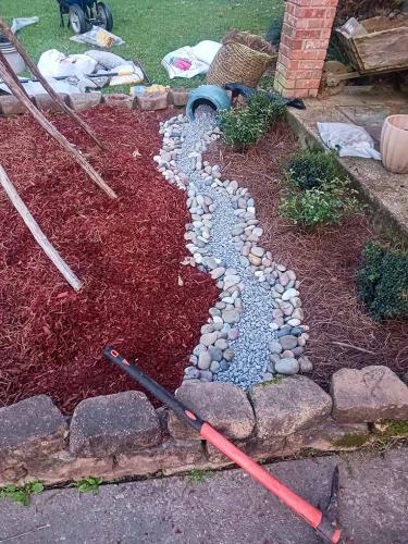 River Rock Flower Bed Installation